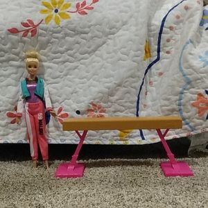 A barbie with a beam.